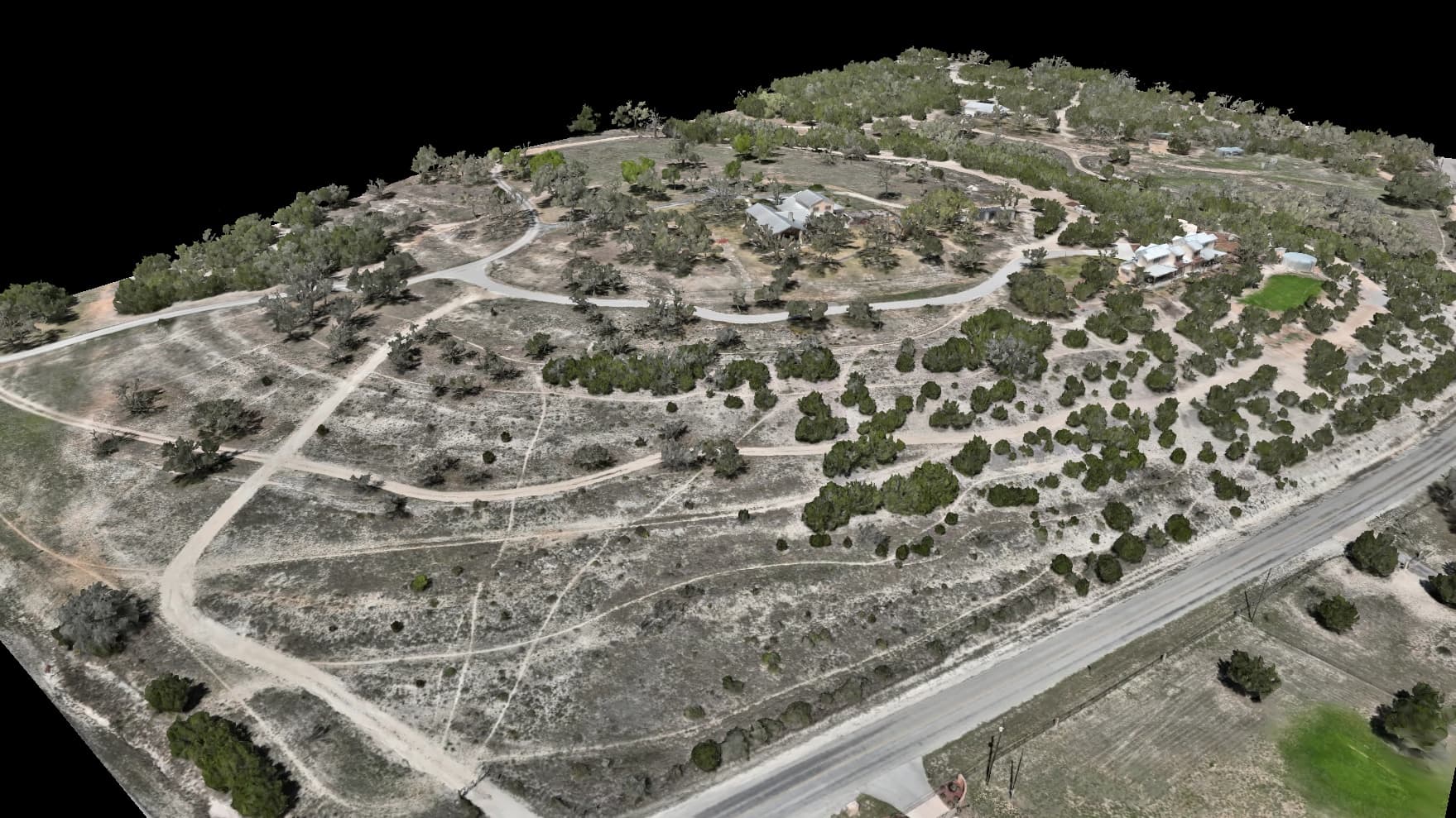 Photoreal 3D model of a large Hill Country property captured from the air